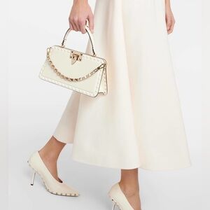 VALENTINO GARAVANI 
Calfskin Tonal Small Rockstud Top Handle Handbag Ivory